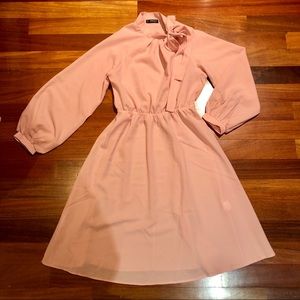 Flared pink long sleeve dress